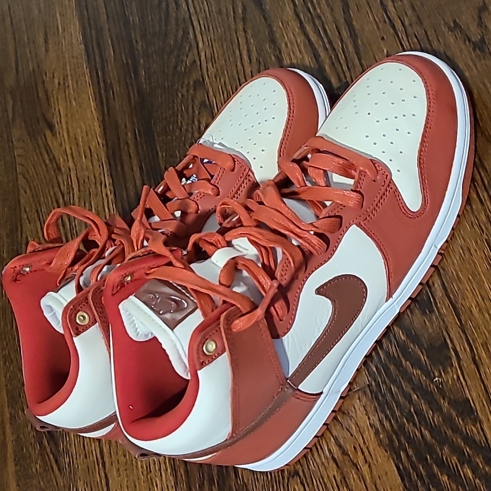 Nike new with tags red and white high tops, size women's 9.5